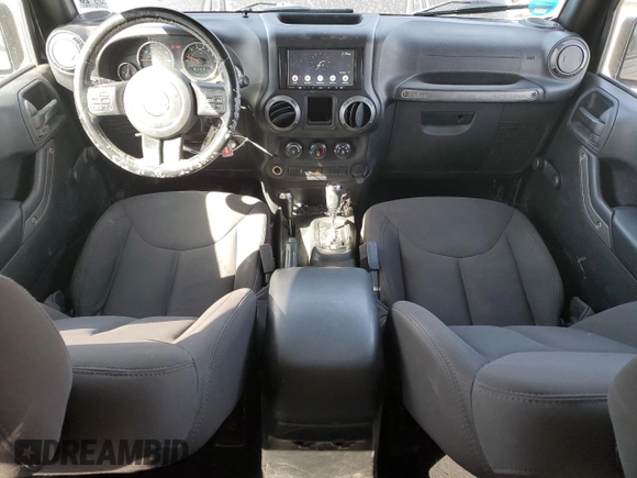 2017 Jeep Wrangler Sport with VIN 1C4AJWAGXHL715362, listed as a Copart auction lot 51262305 with 62,297 mi miles and Salvage Title. Bid and sale history available at DreamBid. Image 8.