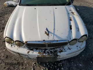 2005 Jaguar X-Type z VIN SAJWB52D55XE26531, wystawiony jako Copart lot #50909445 z przebiegiem 158 861 mil mil oraz Szkoda całkowita • Salvage title. Historia ofert i sprzedaży dostępna na DreamBid. Obrazek 11.