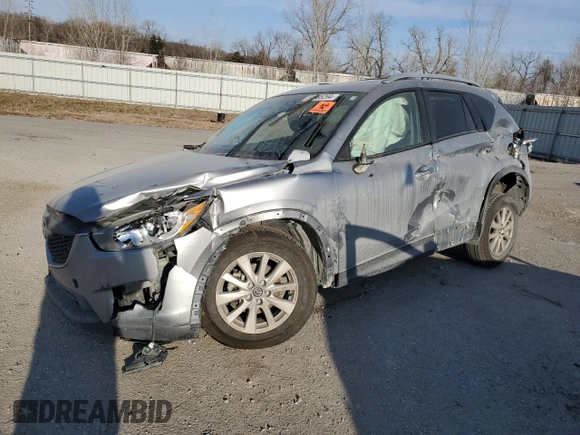 2014 Mazda CX-5 Touring with VIN JM3KE4CY1E0426409, listed as a Copart auction lot 84185294 with 0 mi miles and Salvage Title. Bid and sale history available at carsss.com. Image 1.