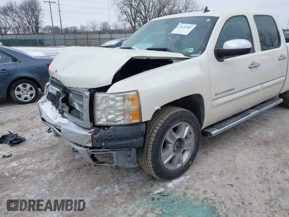 2013 Chevrolet Silverado 1500 LT with VIN 3GCPKSE76DG303067, listed as a IAAI auction lot 41624587 with 113,259 mi miles. Bid and sale history available at carsss.com. Image 2.