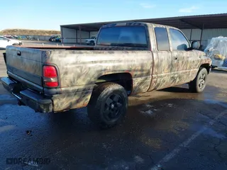 2001 Dodge Ram 1500 with VIN 1B7HC13Y71J290038, listed as a IAAI auction lot 40971921 with 162,943 mi miles. Bid and sale history available at carsss.com. Image 4.