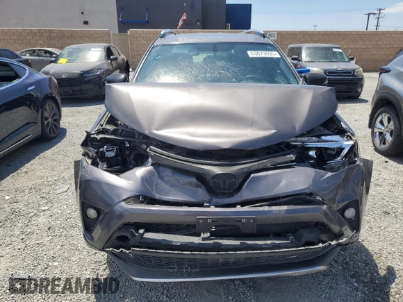 2016 Toyota RAV4 SE with VIN JTMNFREV2GJ072643, listed as a Copart auction lot 63879695 with 104,118 mi miles and Salvage title. Bid and sale history available at DreamBid. Image 5.