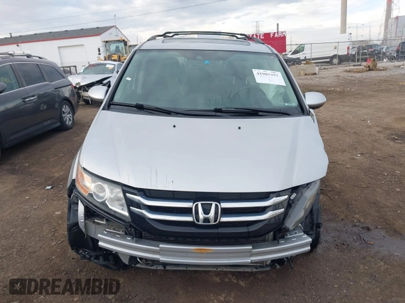 2014 Honda Odyssey EX-L with VIN 5FNRL5H65EB096544, listed as a IAAI auction lot 41903451 with 99,628 mi miles and . Bid and sale history available at carsss.com. Image 12.