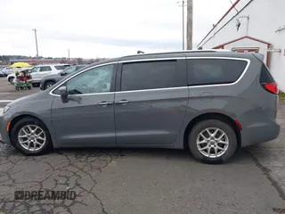 2021 Chrysler Pacifica Touring L with VIN 2C4RC1BG0MR543634, listed as a IAAI auction lot 41513467 with 148,010 mi miles and . Bid and sale history available at DreamBid. Image 14.