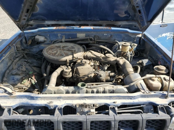 1983 Toyota Pickup z VIN JT4RN48D0D0062446, wystawiony jako Copart lot #59037805 z przebiegiem 157 999 mil mil oraz Czysty tytuł • Clean title. Historia ofert i sprzedaży dostępna na DreamBid. Obrazek 11.