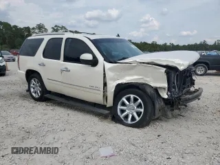 2011 GMC Yukon Denali with VIN 1GKS2EEF0BR378125, listed as a Copart auction lot 72920364 with 148,080 mi miles and Salvage Title. Bid and sale history available at carsss.com. Image 4.