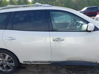 2015 Nissan Pathfinder Platinum with VIN 5N1AR2MN3FC641223, listed as a IAAI auction lot 42013024 with 148,673 mi miles and . Bid and sale history available at DreamBid. Image 14.