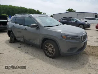 2020 Jeep Cherokee Latitude Plus with VIN 1C4PJLLB0LD653676, listed as a Copart auction lot 55921075 with 98,997 mi miles and Salvage title. Bid and sale history available at DreamBid. Image 4.