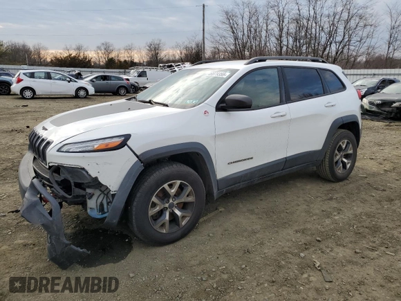 2015 Jeep Cherokee Trailhawk z VIN 1C4PJMBB1FW528766, wystawiony jako Copart lot #46879355 z przebiegiem 248 676 mil mil oraz Szkoda całkowita • Salvage title. Historia ofert i sprzedaży dostępna na DreamBid. Obrazek 1.