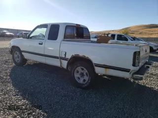 1995 Toyota T100 SR5 with VIN JT4VD12F1S0004904, listed as a Copart auction lot 75796804 with 182,011 mi miles and Salvage Title. Bid and sale history available at DreamBid. Image 2.