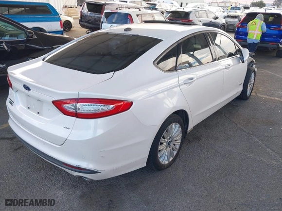 2015 Ford Fusion Energi SE Luxury with VIN 3FA6P0PU6FR205528, listed as a IAAI auction lot 41252552 with 157,302 mi miles. Bid and sale history available at carsss.com. Image 4.