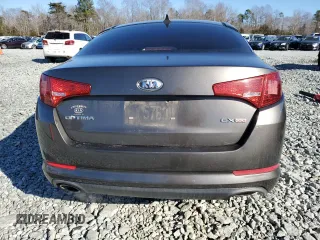 2012 Kia Optima EX z VIN 5XXGN4A77CG031915, wystawiony jako Copart lot #88993055 z przebiegiem 163 289 mil mil oraz Szkoda całkowita • Salvage title. Historia ofert i sprzedaży dostępna na DreamBid. Obrazek 6.