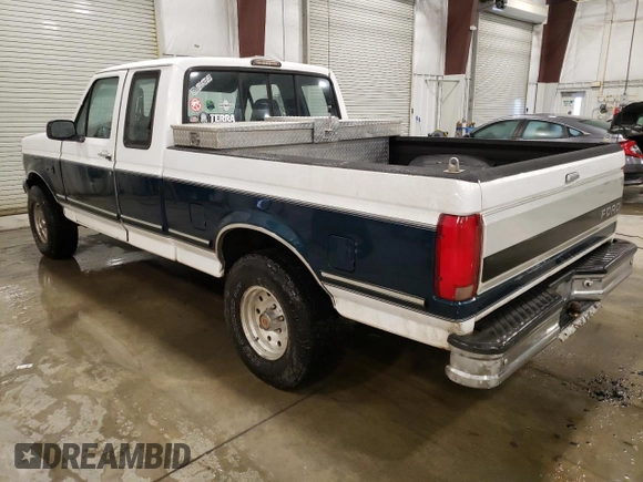 1994 Ford F-150 with VIN 1FTEX15NXRKB34530, listed as a Copart auction lot 84900864 with 133,395 mi miles and Salvage Title. Bid and sale history available at carsss.com. Image 2.