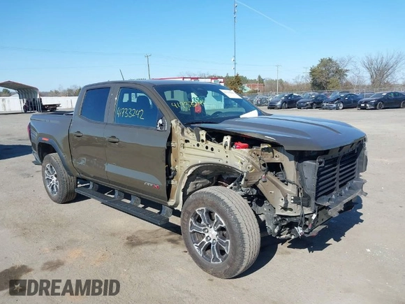 2023 GMC Canyon 4WD AT4 with VIN 1GTP6DEK1P1174713, listed as a IAAI auction lot 41733242 with 35,705 mi miles. Bid and sale history available at carsss.com. Image 1.