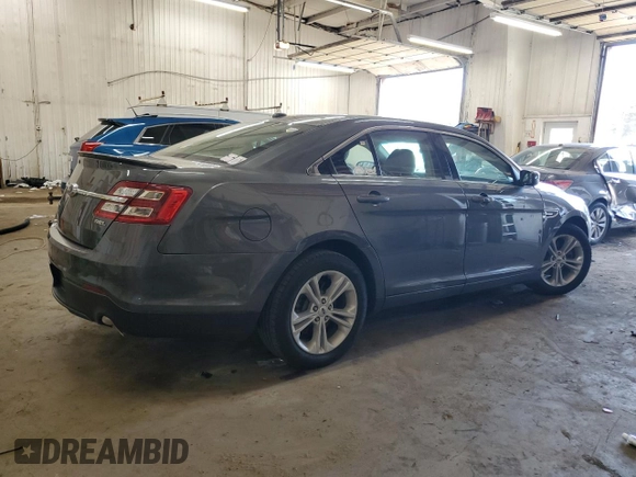 2015 Ford Taurus SEL with VIN 1FAHP2E84FG102318, listed as a Copart auction lot 61744685 with 82,149 mi miles and Salvage title. Bid and sale history available at DreamBid. Image 3.