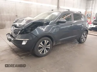 2011 Kia Sportage EX with VIN KNDPCCA27B7037886, listed as a IAAI auction lot 42264598 with 211,538 mi miles and . Bid and sale history available at DreamBid. Image 2.