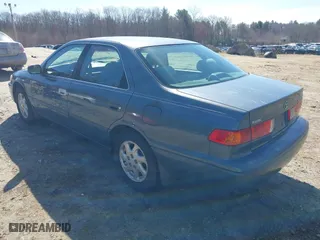 2000 Toyota Camry CE with VIN 4T1BG22KXYU730531, listed as a IAAI auction lot 42003342 with 248,235 mi miles. Bid and sale history available at carsss.com. Image 3.