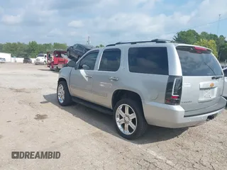 2012 Chevrolet Tahoe LT with VIN 1GNSKBE03CR124911, listed as a IAAI auction lot 40066894 with 151,551 mi miles and . Bid and sale history available at DreamBid. Image 3.
