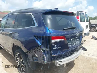 2022 Honda Pilot Touring 7-Passenger with VIN 5FNYF5H61NB019768, listed as a IAAI auction lot 42438780 with Not provided miles and . Bid and sale history available at DreamBid. Image 6.