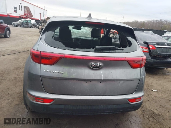 2018 Kia Sportage LX with VIN KNDPMCAC7J7393243, listed as a IAAI auction lot 41484579 with 122,022 mi miles. Bid and sale history available at carsss.com. Image 16.