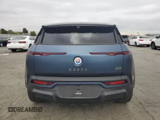 2023 Fisker Ocean One z VIN VCF1ZBU25PG002605, wystawiony jako Copart lot #72085984 z przebiegiem 13 931 mil mil oraz Szkody całkowita. Historia ofert i sprzedaży dostępna na DreamBid. Obrazek 6.