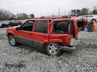 1998 Jeep Grand Cherokee Laredo with VIN 1J4GZ58S6WC104114, listed as a Copart auction lot 84232604 with 0 mi miles and Salvage Title. Bid and sale history available at carsss.com. Image 2.
