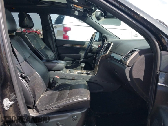 2014 Jeep Grand Cherokee Overland with VIN 1C4RJFCT8EC106005, listed as a IAAI auction lot 41989721 with 148,469 mi miles and . Bid and sale history available at DreamBid. Image 5.