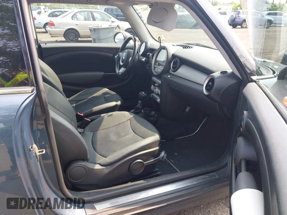 2010 MINI Hardtop with VIN WMWMF3C57ATZ61622, listed as a IAAI auction lot 42467602 with 94,937 mi miles and . Bid and sale history available at DreamBid. Image 5.