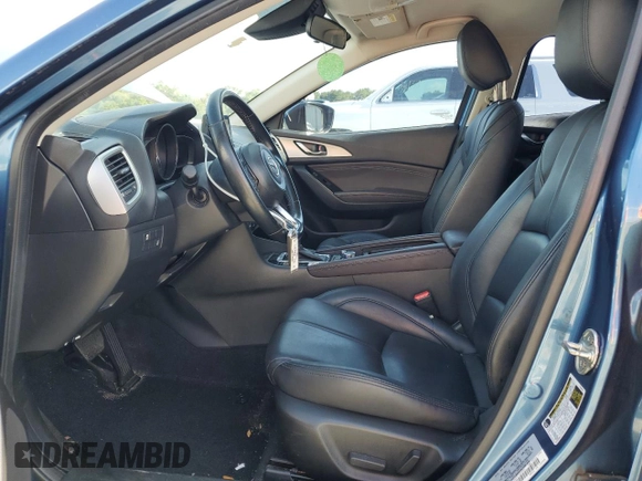 2017 Mazda 3 Touring z VIN JM1BN1L7XH1102372, wystawiony jako Copart lot #61180195 z przebiegiem 57 606 mil mil oraz Szkoda całkowita • Salvage title. Historia ofert i sprzedaży dostępna na DreamBid. Obrazek 7.