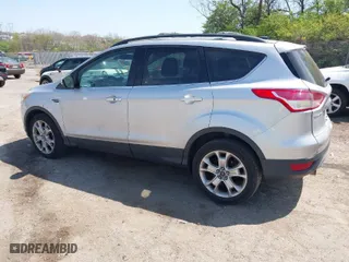 2013 Ford Escape SEL with VIN 1FMCU9HX5DUC09591, listed as a IAAI auction lot 42074088 with 131,554 mi miles. Bid and sale history available at carsss.com. Image 3.