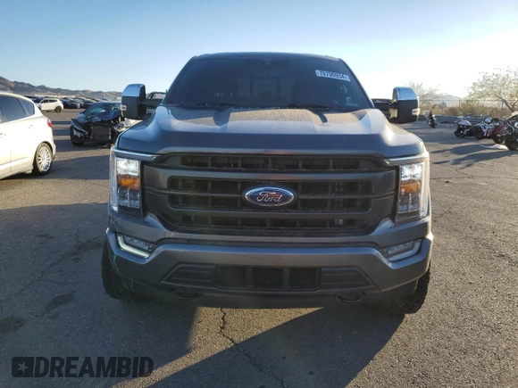 2022 Ford F-150 XL with VIN 1FTFW1E89NFA14920, listed as a Copart auction lot 76790934 with 64,991 mi miles and Salvage Title. Bid and sale history available at DreamBid. Image 5.