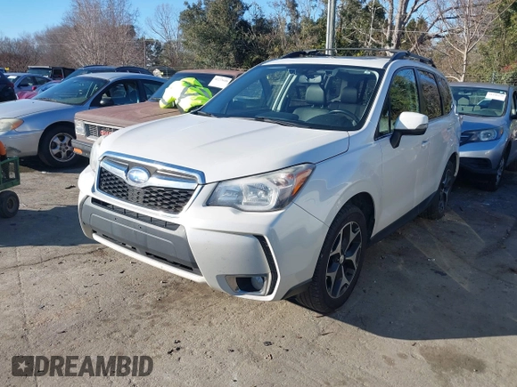 2014 Subaru Forester XT Touring with VIN JF2SJGPC9EH417920, listed as a IAAI auction lot 41270689 with 184,976 mi miles and . Bid and sale history available at DreamBid. Image 2.
