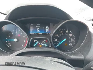 2018 Ford Escape SE z VIN 1FMCU9GD6JUA18684, wystawiony jako IAAI lot #41499540 z przebiegiem 105 127 mil mil oraz . Historia ofert i sprzedaży dostępna na DreamBid. Obrazek 7.