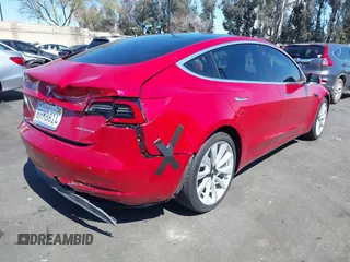 2018 Tesla Model 3 Long Range Battery with VIN 5YJ3E1EB5JF146184, listed as a IAAI auction lot 41808346 with 97,496 mi miles and . Bid and sale history available at DreamBid. Image 4.