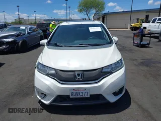 2015 Honda Fit EX-L with VIN 3HGGK5H89FM740430, listed as a IAAI auction lot 42255324 with 116,995 mi miles and . Bid and sale history available at DreamBid. Image 13.