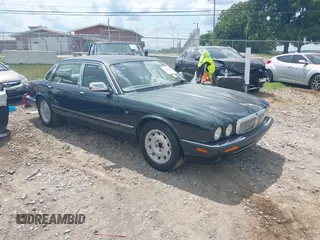 1999 Jaguar XJ with VIN SAJKD6048XC869099, listed as a IAAI auction lot 42761055 with 124,326 mi miles and . Bid and sale history available at DreamBid. Image 1.