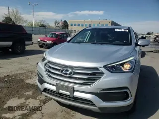 2018 Hyundai Santa Fe 2.4L z VIN 5XYZTDLB7JG572441, wystawiony jako Copart lot #52810145 z przebiegiem 106 578 mil mil oraz Szkoda całkowita • Salvage title. Historia ofert i sprzedaży dostępna na DreamBid. Obrazek 14.