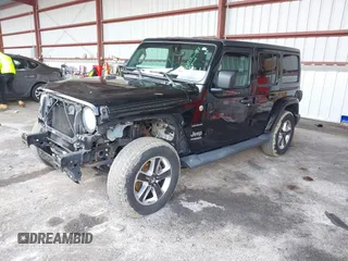 2019 Jeep Wrangler Unlimited Sahara with VIN 1C4HJXEG5KW532861, listed as a IAAI auction lot 41698912 with 121,278 mi miles and . Bid and sale history available at DreamBid. Image 2.
