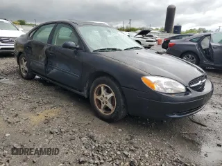 2003 Ford Taurus SEL Deluxe with VIN 1FAHP56S83A225002, listed as a Copart auction lot 49456975 with 199,759 mi miles and Salvage Title. Bid and sale history available at DreamBid. Image 4.