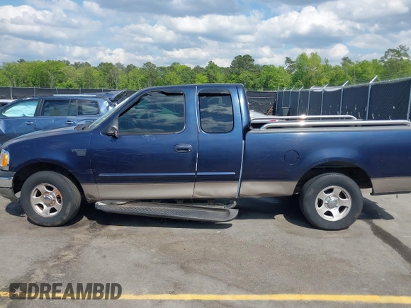 2002 Ford F-150 XL with VIN 1FTRX17L92NA56050, listed as a IAAI auction lot 41992155 with 1 mi miles. Bid and sale history available at carsss.com. Image 14.
