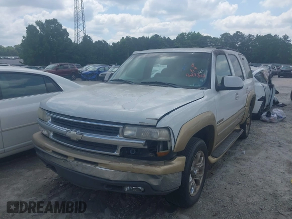2001 Chevrolet Tahoe LS z VIN 1GNEC13T11R162930, wystawiony jako IAAI lot #42373226 z przebiegiem 335 448 mil mil oraz . Historia ofert i sprzedaży dostępna na DreamBid. Obrazek 2.