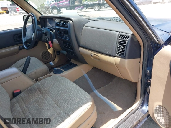 2001 Jeep Cherokee Sport with VIN 1J4FT48S01L603930, listed as a IAAI auction lot 42503730 with 149,030 mi miles and . Bid and sale history available at DreamBid. Image 5.