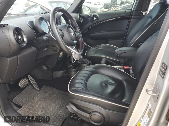 2016 MINI Countryman John Cooper Works with VIN WMWXD1C52GWT97652, listed as a Copart auction lot 49282345 with 51,983 mi miles and Salvage Title. Bid and sale history available at DreamBid. Image 7.