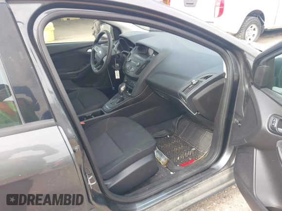 2018 Ford Focus SE with VIN 1FADP3F29JL288761, listed as a IAAI auction lot 42290510 with 93,463 mi miles and . Bid and sale history available at DreamBid. Image 5.
