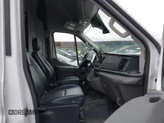 2021 Ford Transit Cargo with VIN 1FTBR1X82MKA98734, listed as a IAAI auction lot 41424123 with 84,453 mi miles and . Bid and sale history available at DreamBid. Image 5.