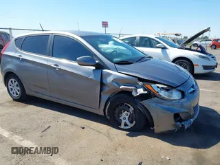 2014 Hyundai Accent GS with VIN KMHCT5AE2EU174854, listed as a IAAI auction lot 42778947 with 114,292 mi miles and . Bid and sale history available at DreamBid. Image 1.