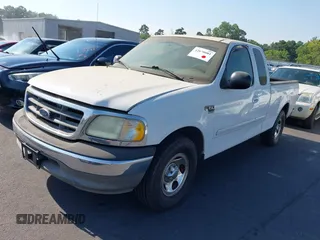 2003 Ford F-150 XL with VIN 1FTRX17W13NB93902, listed as a IAAI auction lot 42670081 with 145,918 mi miles and . Bid and sale history available at DreamBid. Image 2.