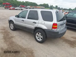 2006 Ford Escape XLT z VIN 1FMYU03136KA68913, wystawiony jako IAAI lot #42265822 z przebiegiem 129 401 mil mil oraz . Historia ofert i sprzedaży dostępna na DreamBid. Obrazek 3.