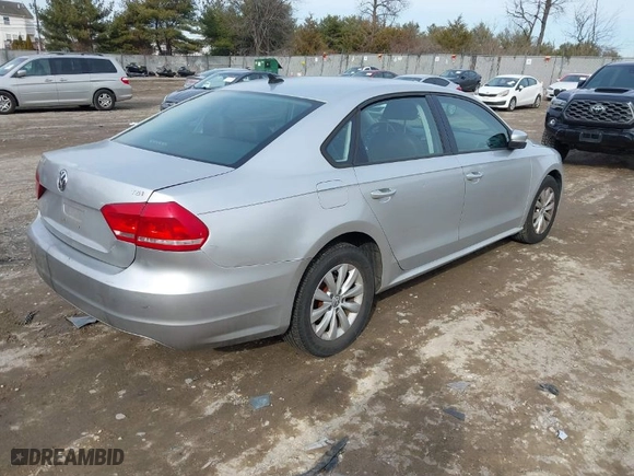 2015 Volkswagen Passat 1.8T S with VIN 1VWAT7A30FC013994, listed as a IAAI auction lot 41509741 with 85,328 mi miles. Bid and sale history available at carsss.com. Image 4.