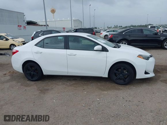 2019 Toyota Corolla L with VIN 5YFBURHE1KP930676, listed as a IAAI auction lot 41940047 with 82,885 mi miles. Bid and sale history available at carsss.com. Image 13.